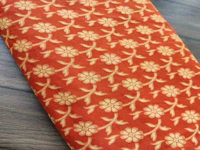 orange-jacquard-fabric-with-yellow-flowers
