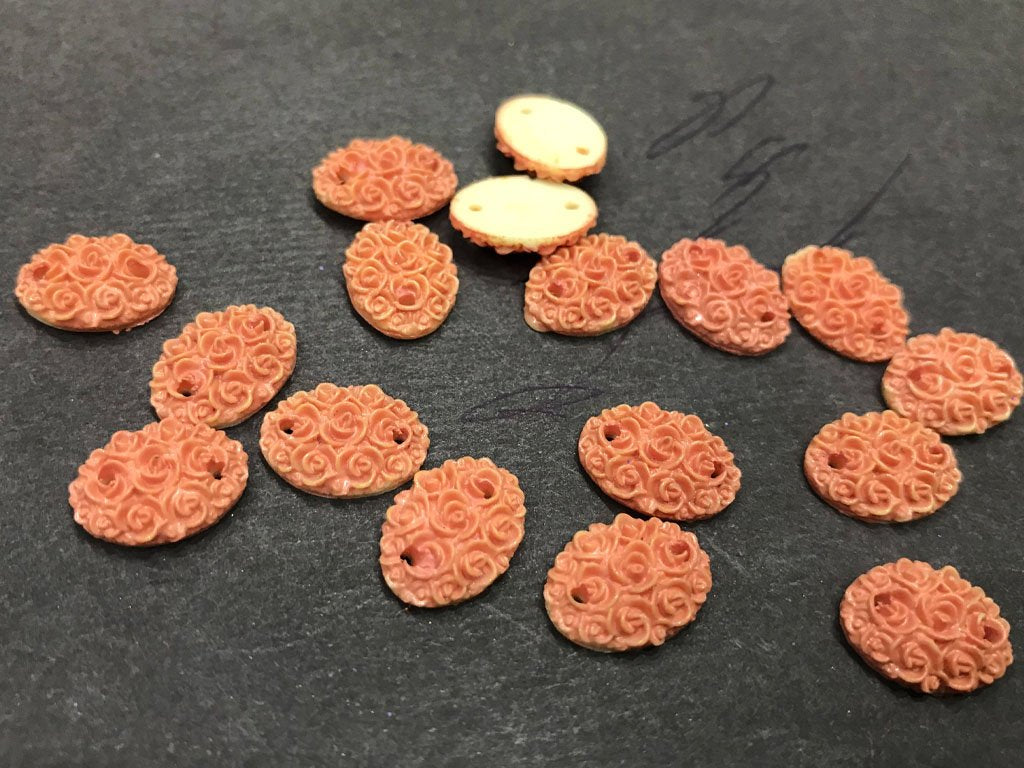 orange-matte-flower-oval-resin-stone-2-hole-14x10-mm