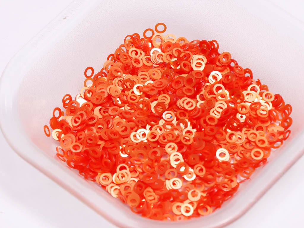 orange-ring-plastic-sequins