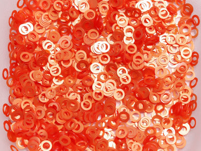 orange-ring-plastic-sequins