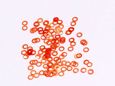 orange-ring-plastic-sequins