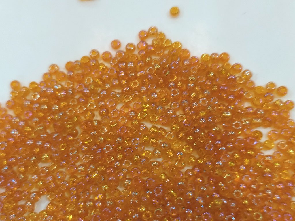 orange-transparent-rainbow-round-rocaille-seed-beads