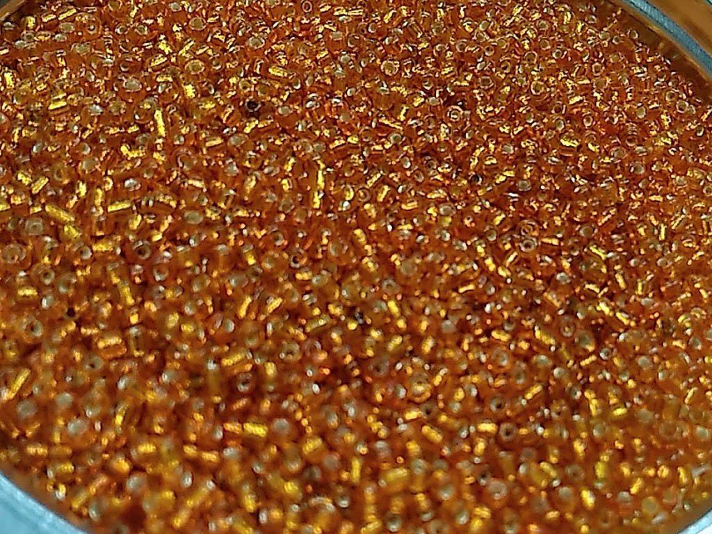 orange-transparent-silverline-round-rocaille-glass-seed-beads