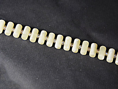 pastel-yellow-cylindrical-resin-beads