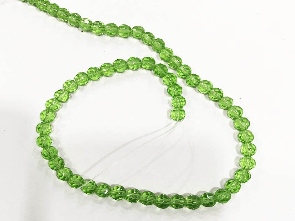 peridot-green-football-pressed-glass-beads-6-mm