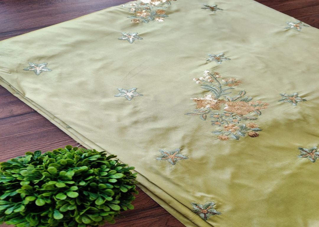 pista-green-taffeta-silk-with-sequins-and-thread-motifs-all-over