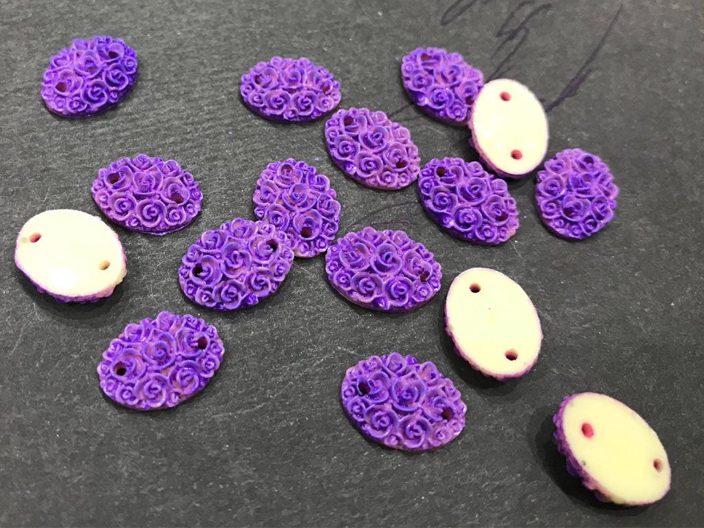 purple-matte-flower-oval-resin-stone-2-hole-14x10-mm