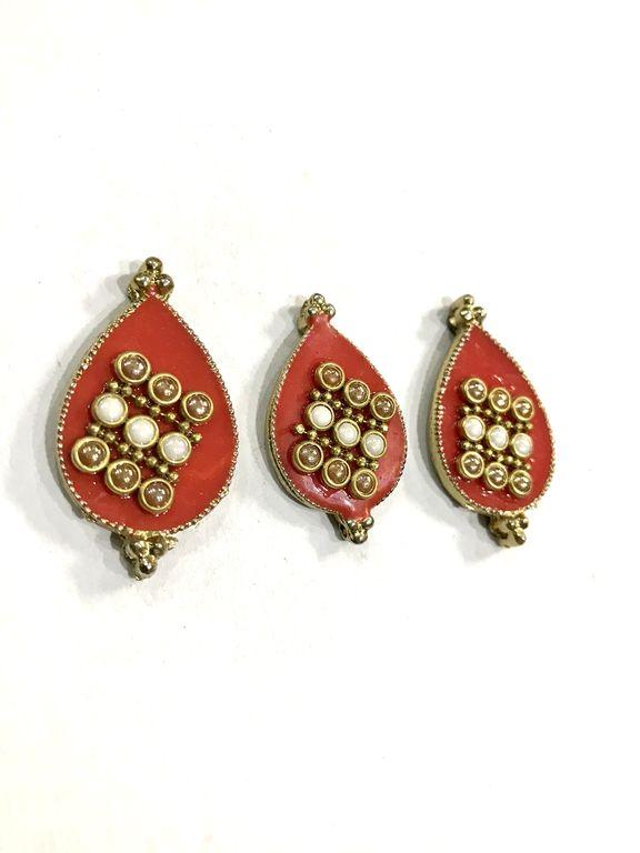 red-drop-shaped-metal-show-button