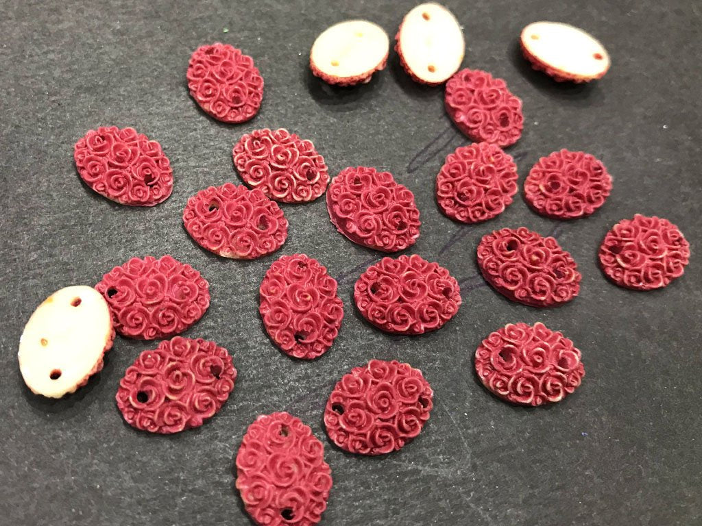 red-matte-flower-oval-resin-stone-2-hole-14x10-mm