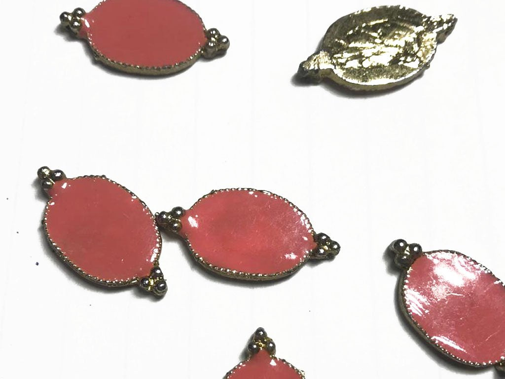 red-oval-2-hole-metal-embellishment-with-enamel-26x15-mm