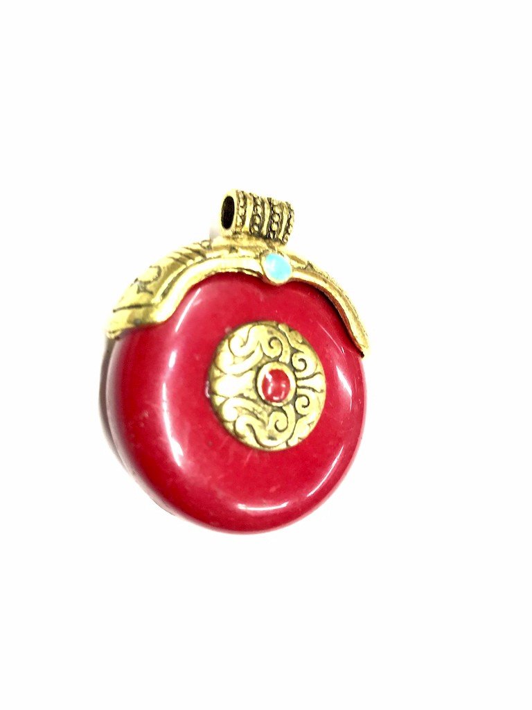 red-pendant-with-golden-cap