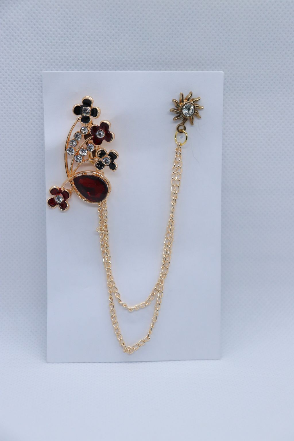 red-stone-with-black-flower-brooch