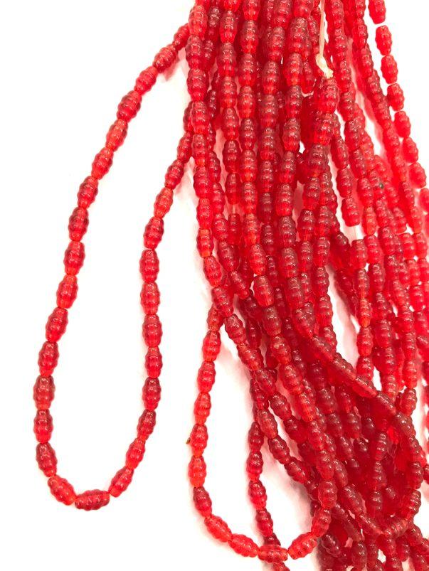 red-tansparent-fancy-oval-pressed-beads