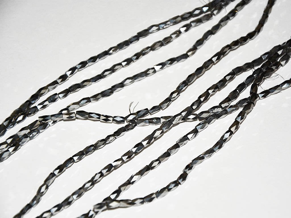 silver-faceted-tube-crystal-beads