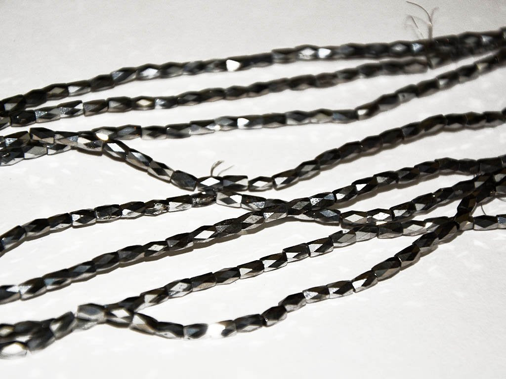 silver-faceted-tube-crystal-beads