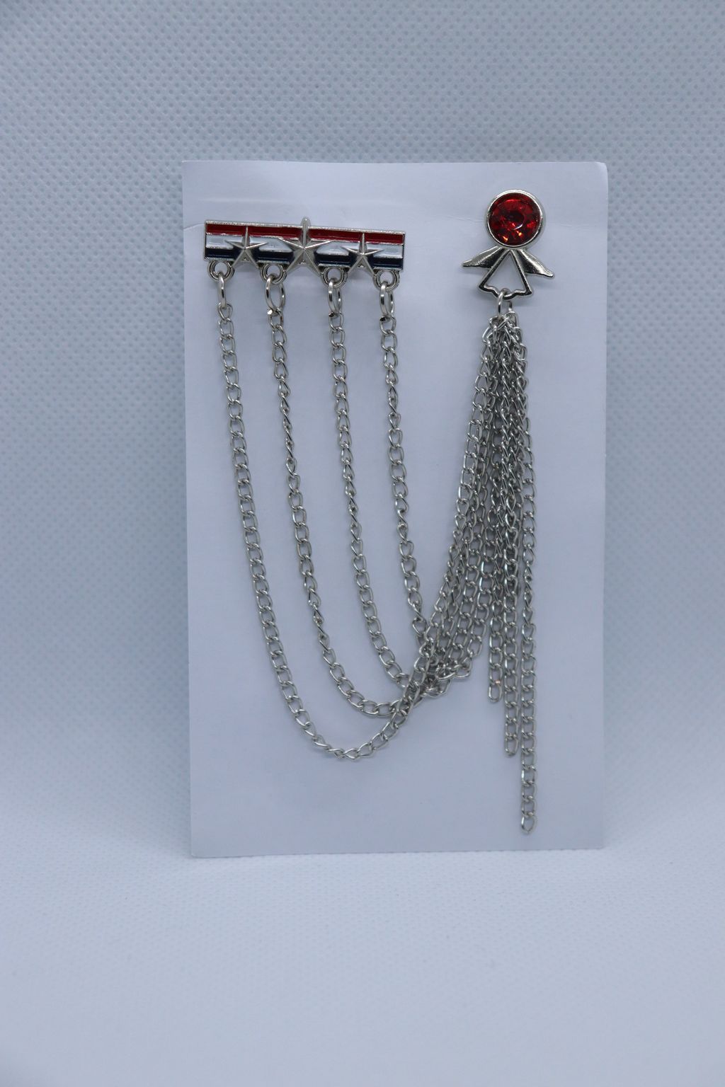 silver-flag-with-red-stone-metallic-brooch