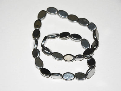 silver-flat-oval-glass-beads