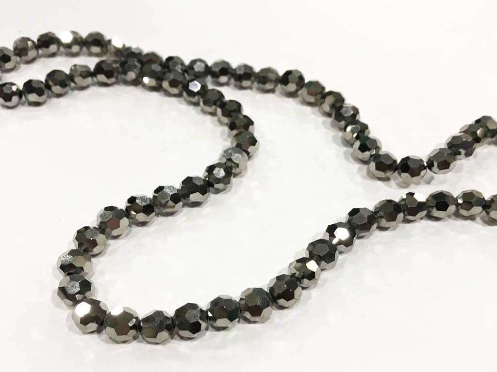 silver-football-pressed-glass-beads-4-mm