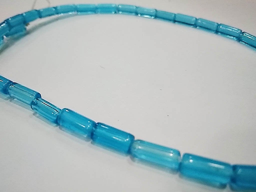 sky-blue-transparent-lustre-pipe-pressed-glass-beads-4x10-mm