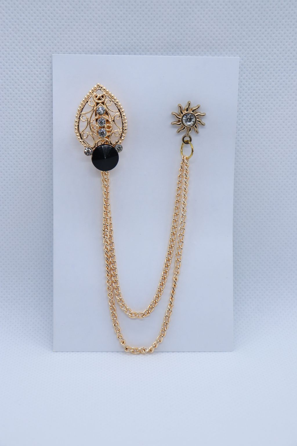 tear-drop-design-with-black-crystal-brooch