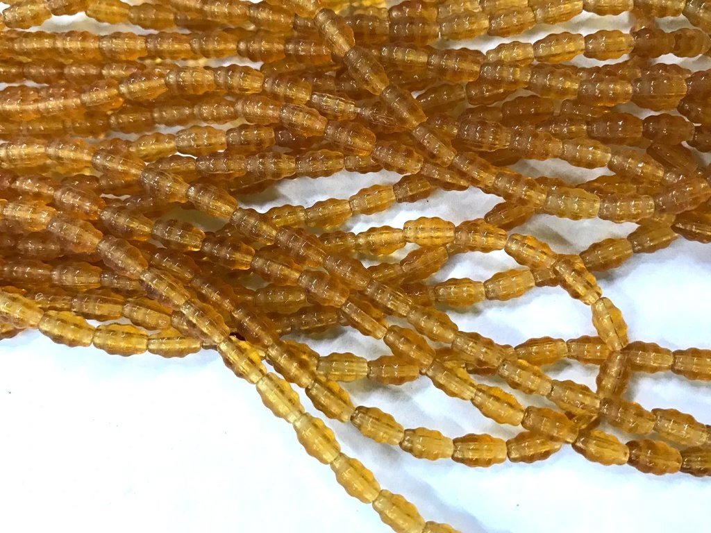 topaz-brown-fancy-oval-pressed-glass-beads
