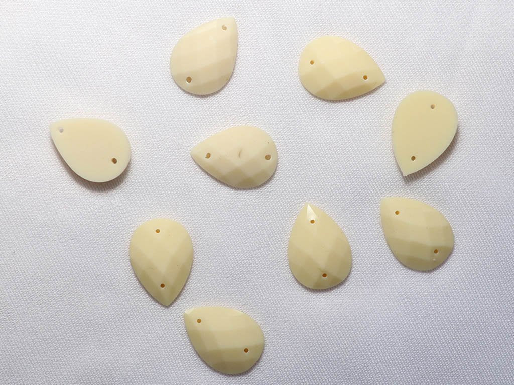 white-2-hole-drop-dyeable-plastic-stones-18x13-mm