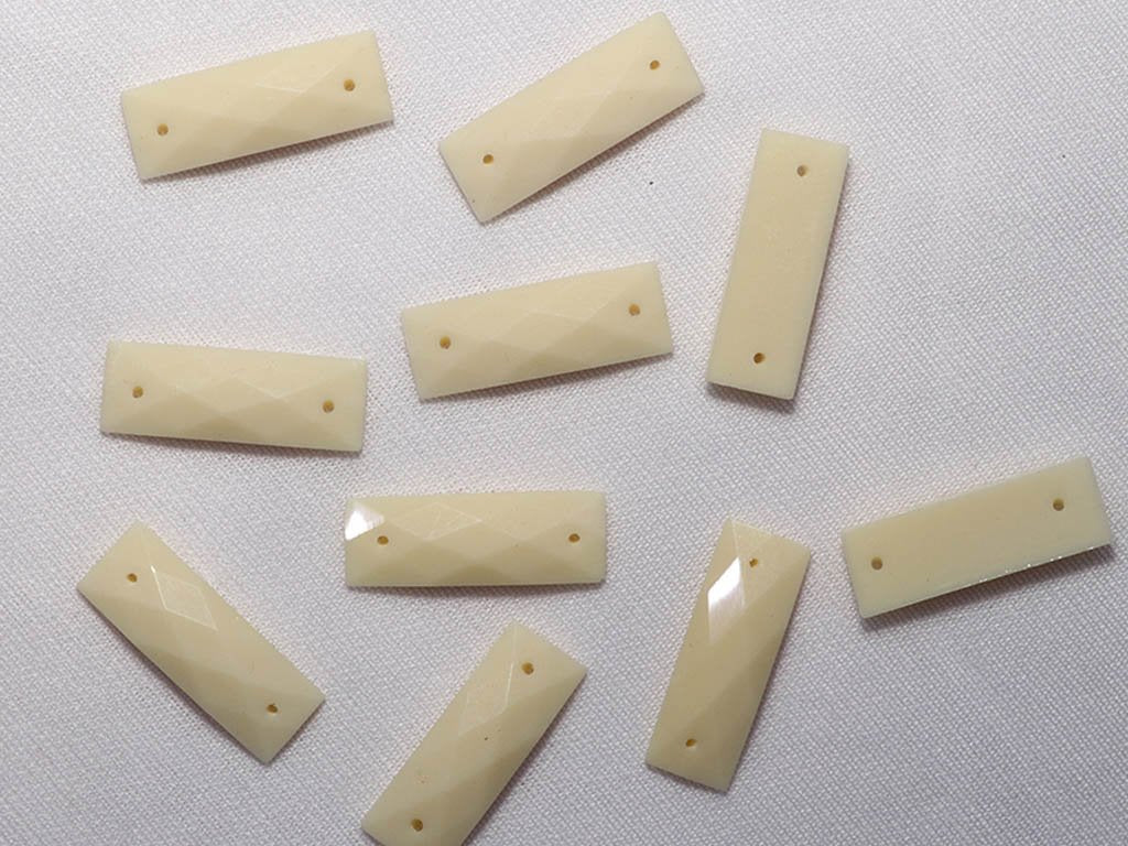 white-2-hole-rectangular-dyeable-plastic-stones-8x24-mm