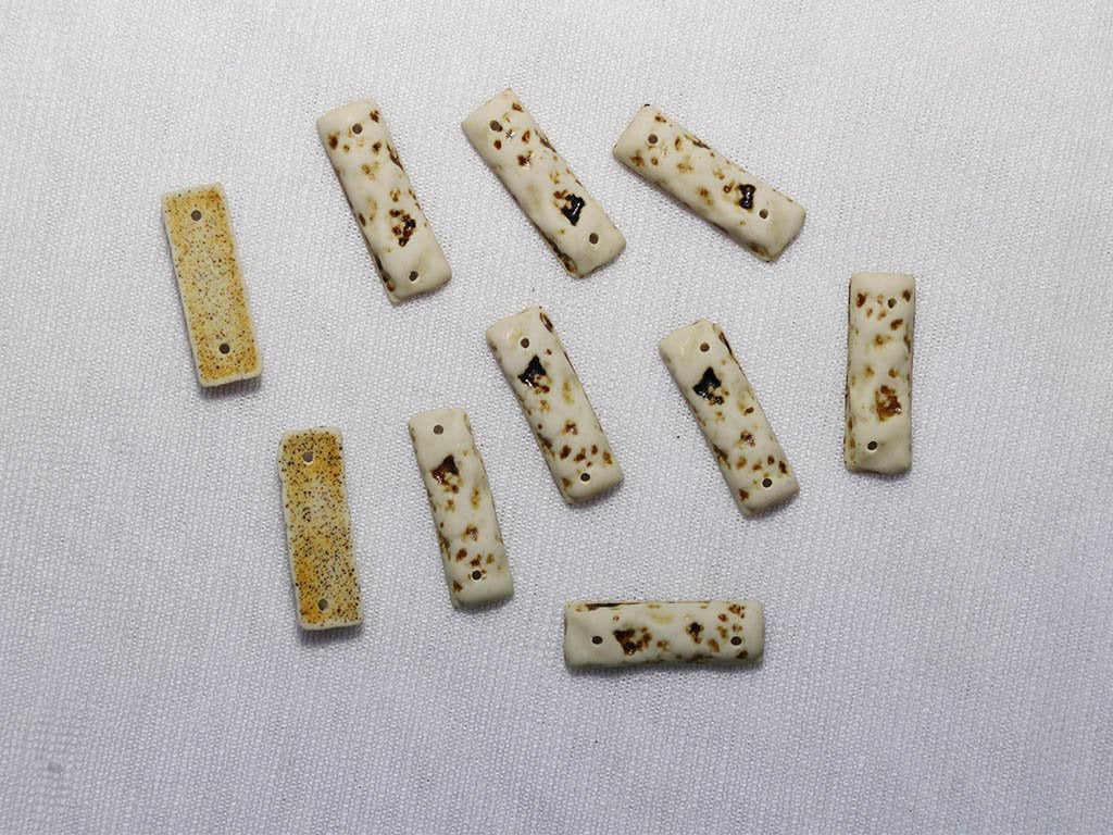 white-black-textured-designer-rectangular-plastic-stones-6x18-mm