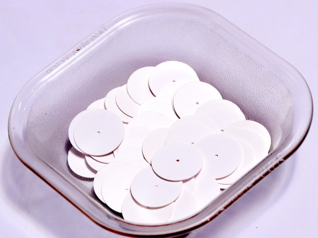 white-centre-hole-circular-plastic-sequins