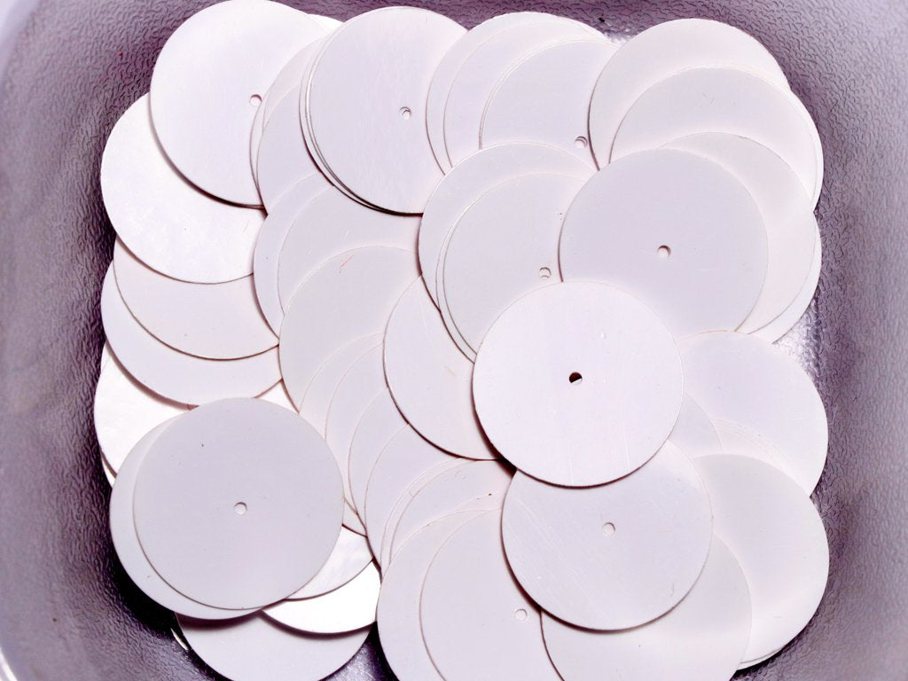 white-centre-hole-circular-plastic-sequins