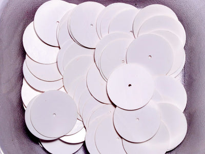 white-centre-hole-circular-plastic-sequins