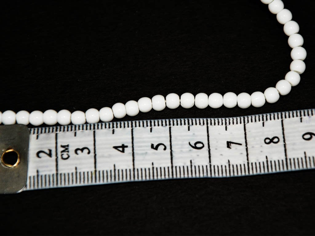 white-circular-opaque-pressed-glass-beads