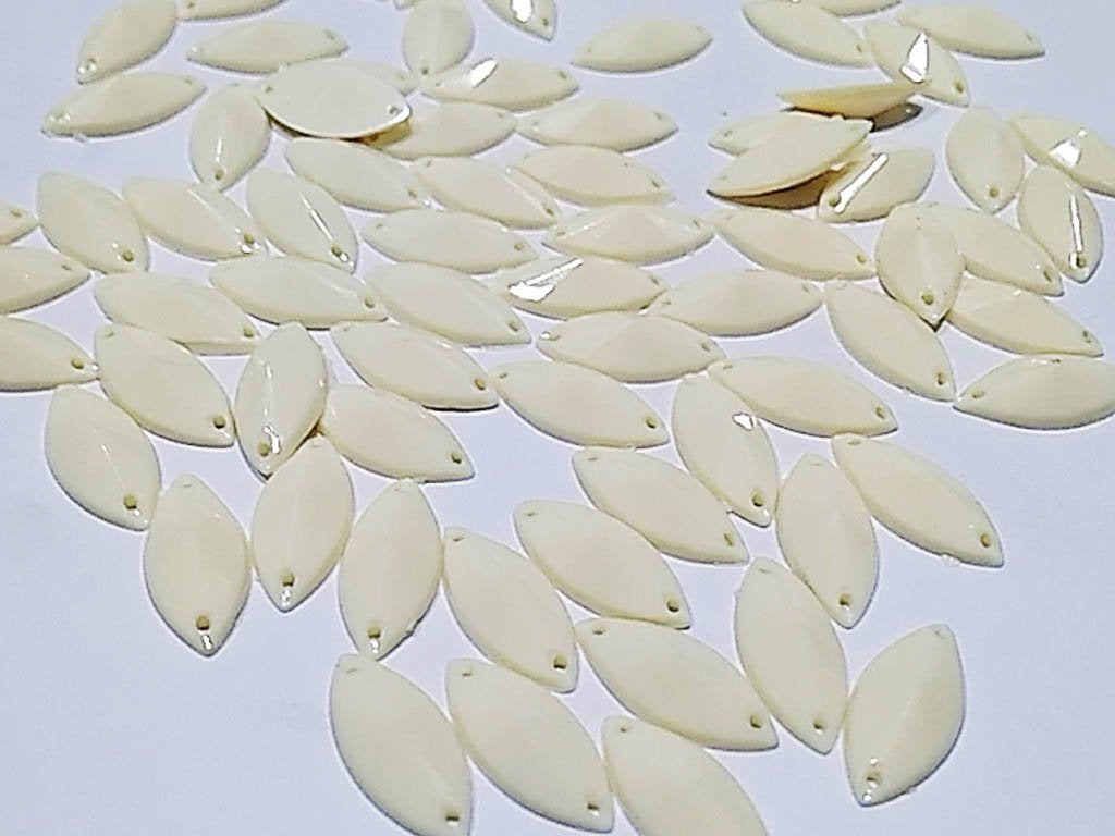 white-dyeable-eye-2-hole-plastic-stones-18x9-mm