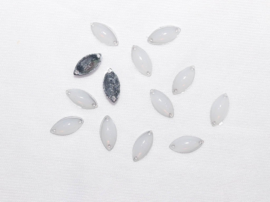 white-dyeable-eye-plastic-stones-15x7-mm