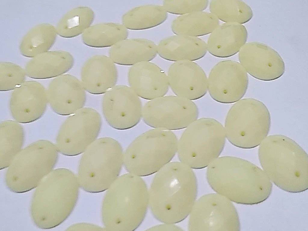 white-dyeable-oval-2-hole-plastic-stones-10x12-mm