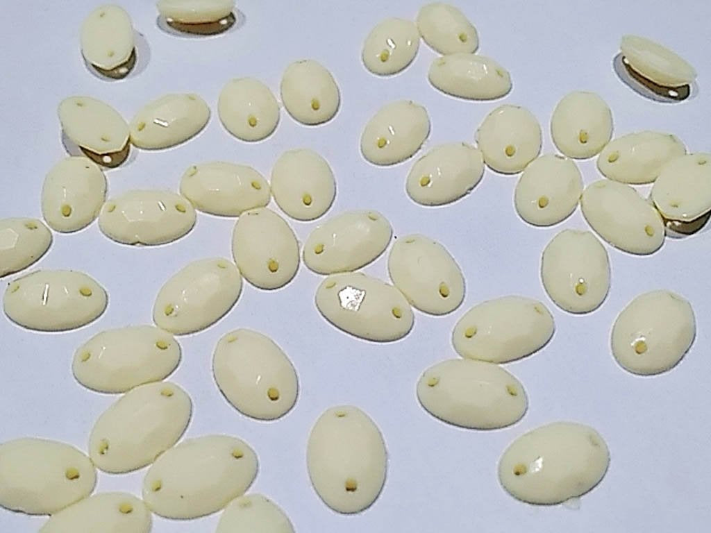 white-dyeable-oval-2-hole-plastic-stones-8x6-mm