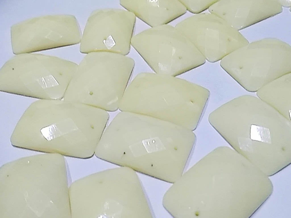 white-dyeable-rectangular-2-hole-plastic-stones-25x18-mm