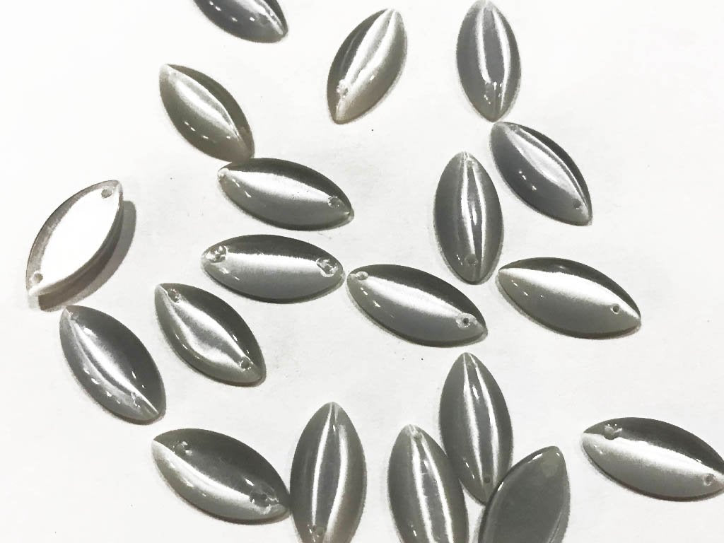 white-eye-2-hole-glass-stones-15x7-mm
