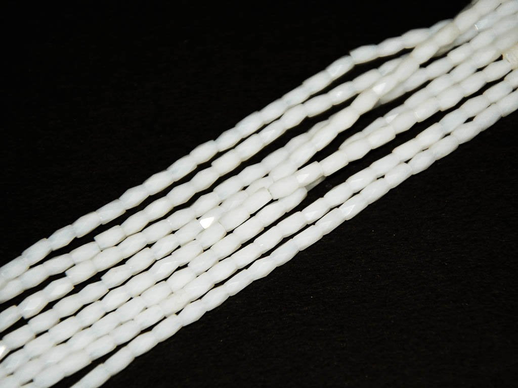 white-opaque-faceted-tube-crystal-beads