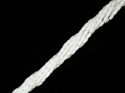 white-opaque-faceted-tube-crystal-beads