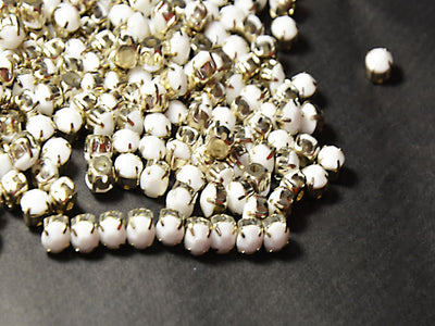 white-plastic-beads-with-cather