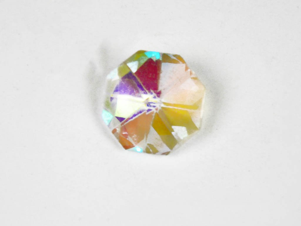 white-rainbow-hexagonal-faceted-glass-stone