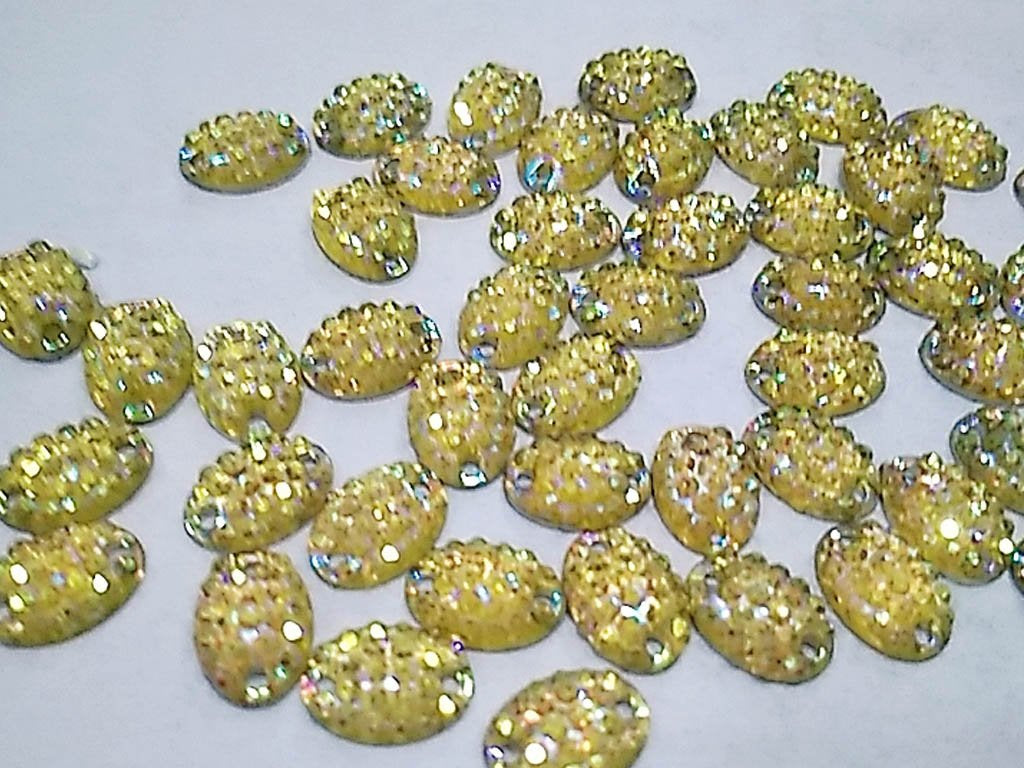 white-rainbow-oval-sugar-2-hole-plastic-stones-18x13-mm
