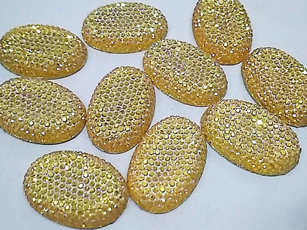 white-rainbow-oval-sugar-2-hole-plastic-stones-25x18-mm