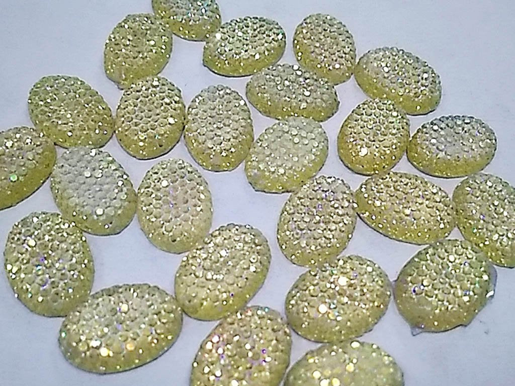 white-rainbow-oval-sugar-2-hole-plastic-stones-8x6-mm