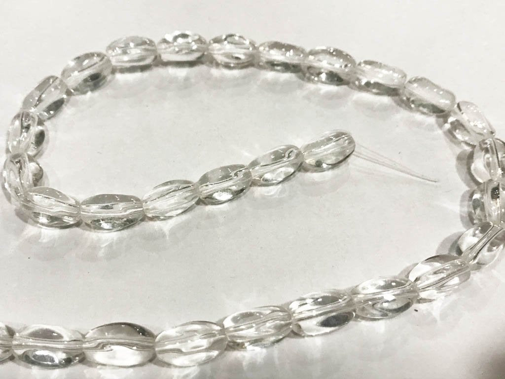 white-transparent-fancy-oval-pressed-glass-beads-8x12-mm