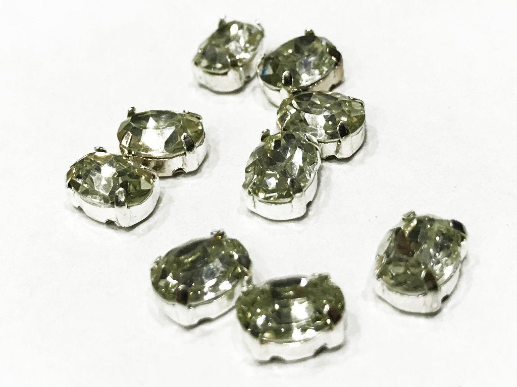 white-transparent-oval-glass-stone-with-silver-catcher-8x6-mm