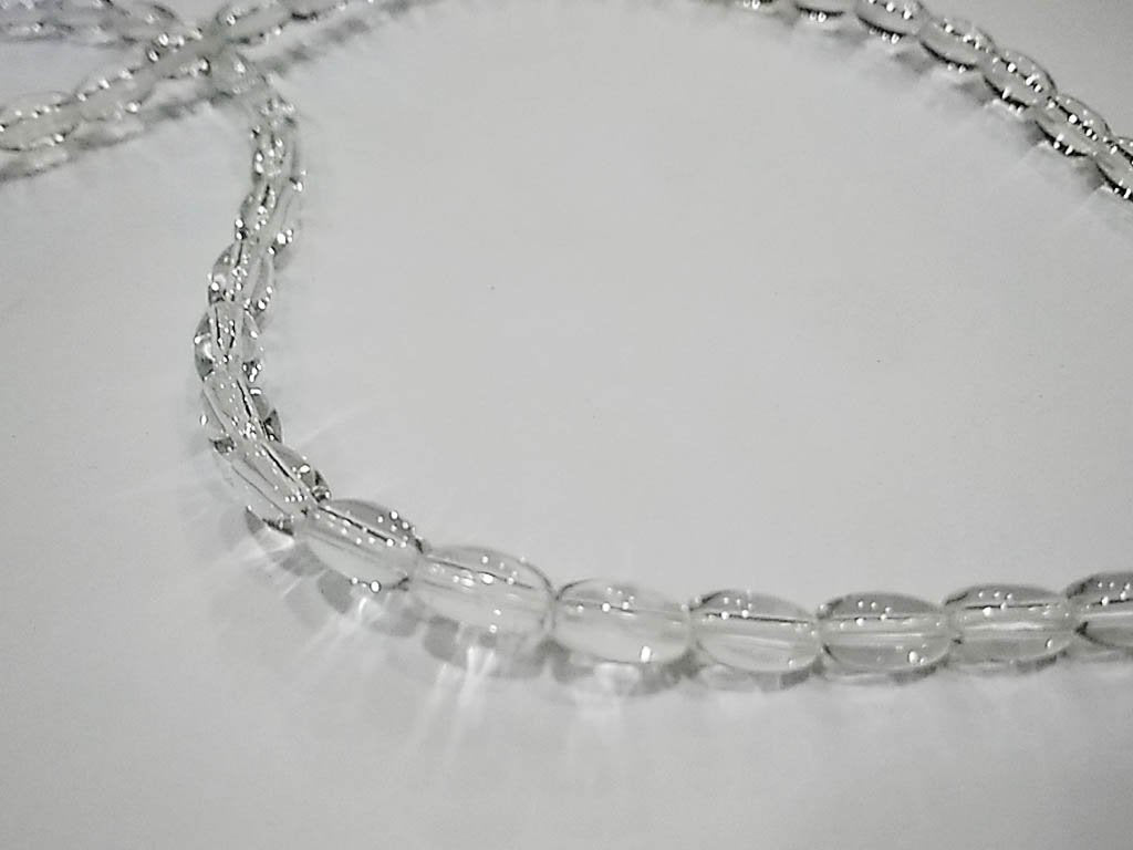 white-transparent-oval-pressed-glass-beads-4x7-mm