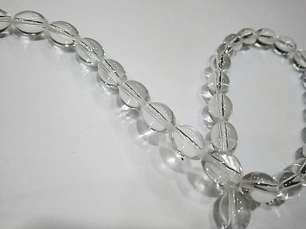 white-transparent-oval-pressed-glass-beads-7x10-mm