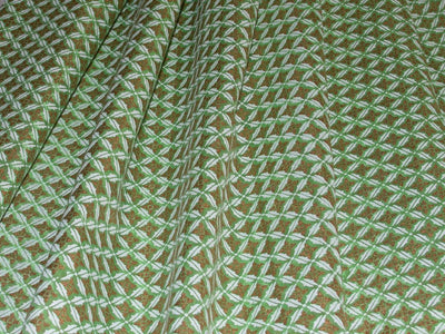 white-and-gold-floral-design-on-green-base-chaderi-fabric